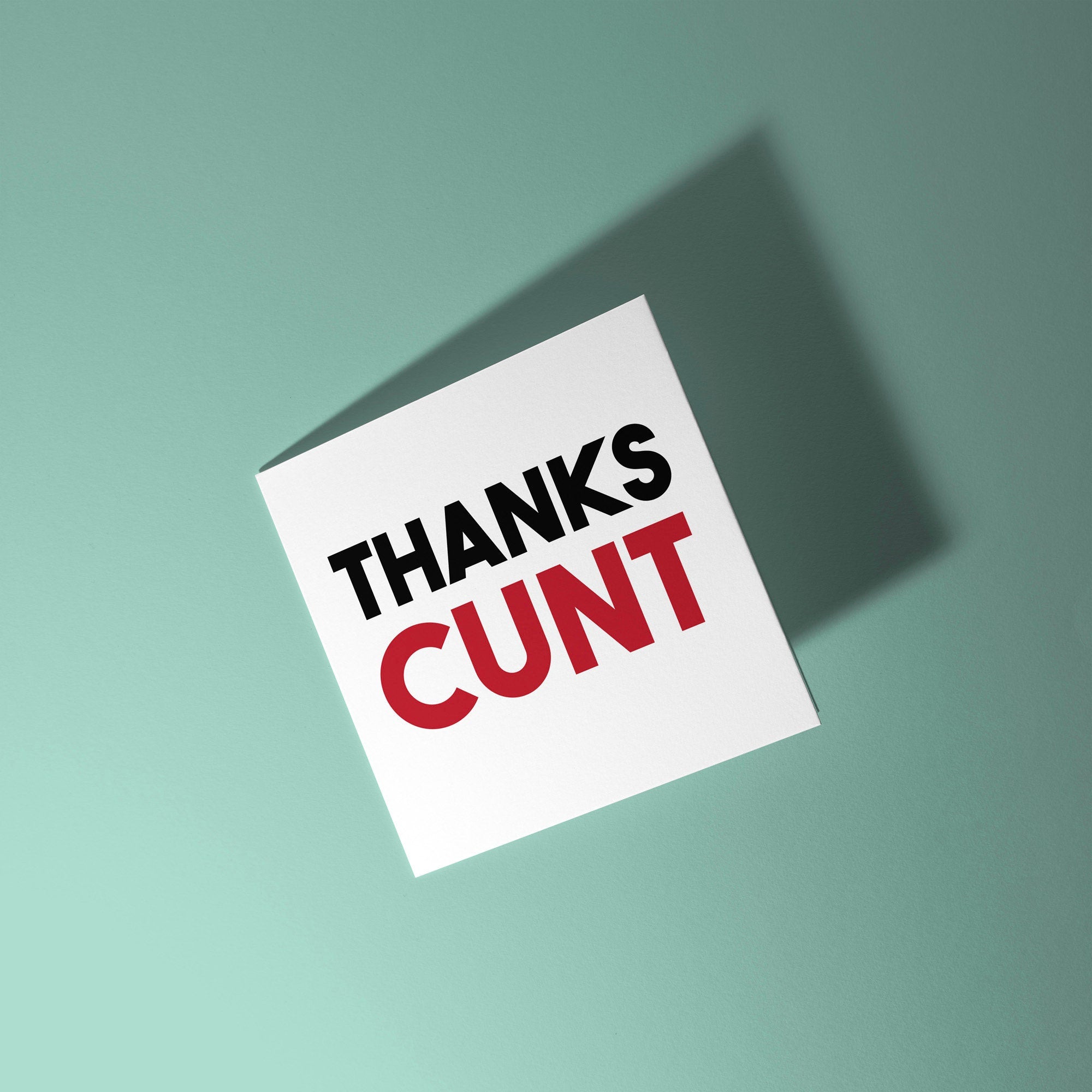Card with 'THANKS CUNT' text on a light green background