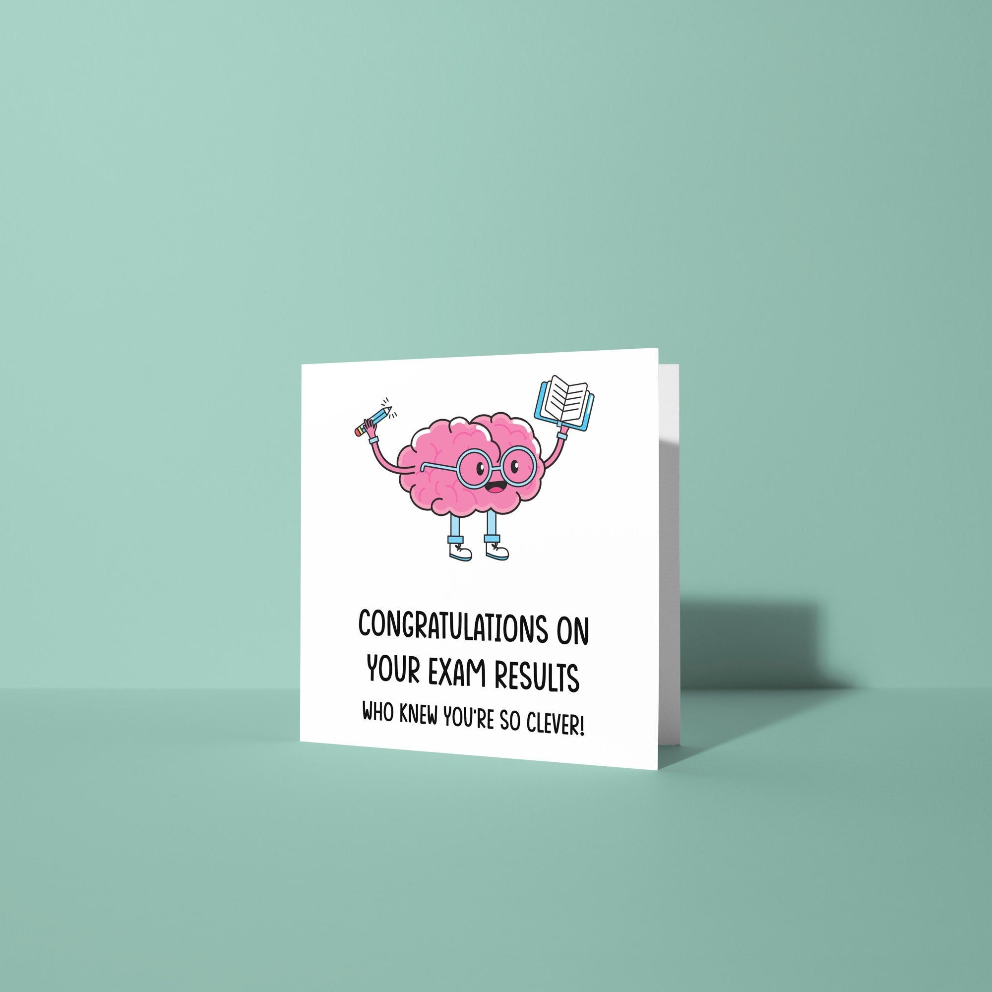 Card with a cartoon brain holding a book and a congratulations message on a light green background