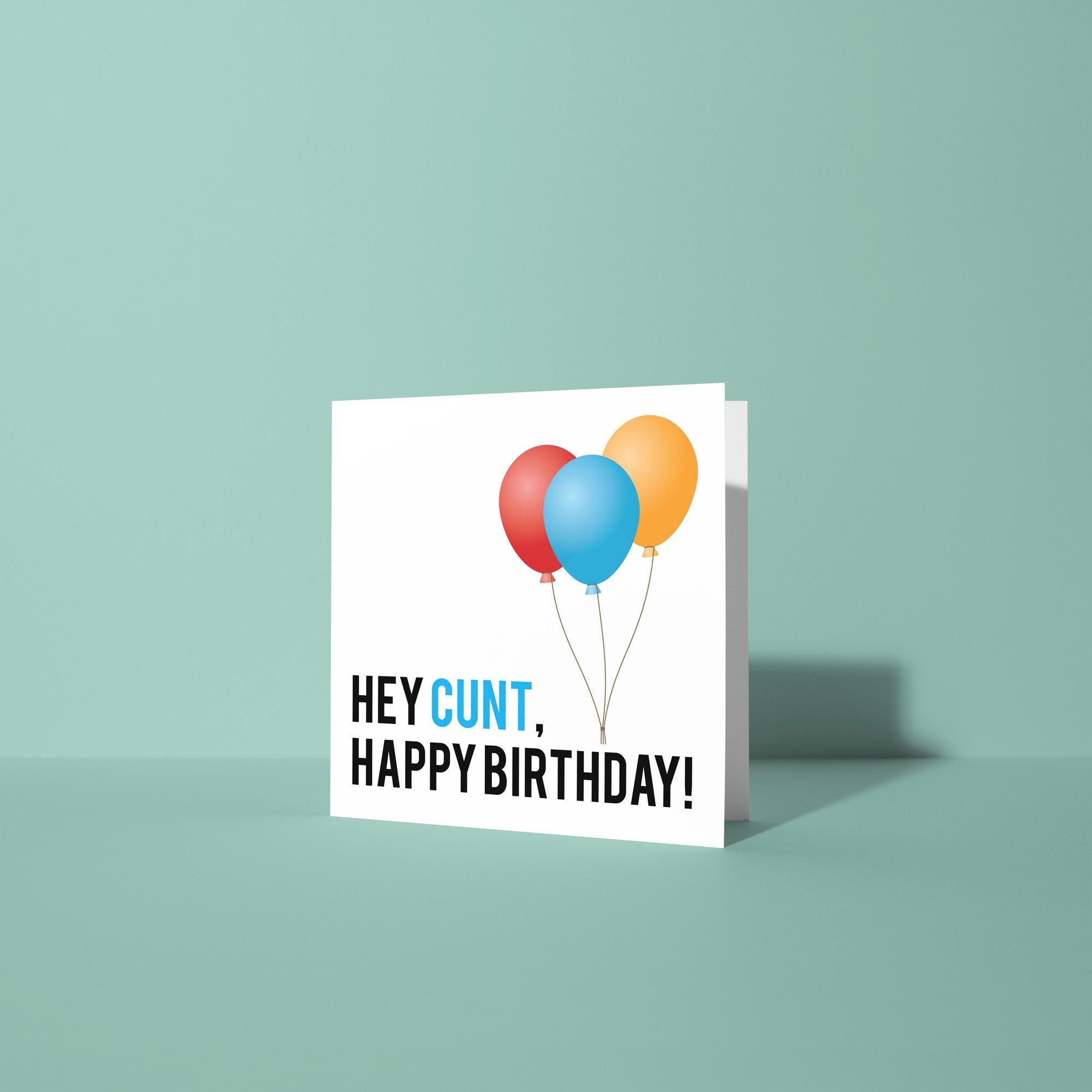 Card with colorful balloons and text on a light green background